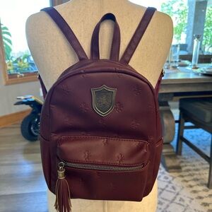 Harry Potter world burgundy Griffindor 11” backpack unused condition